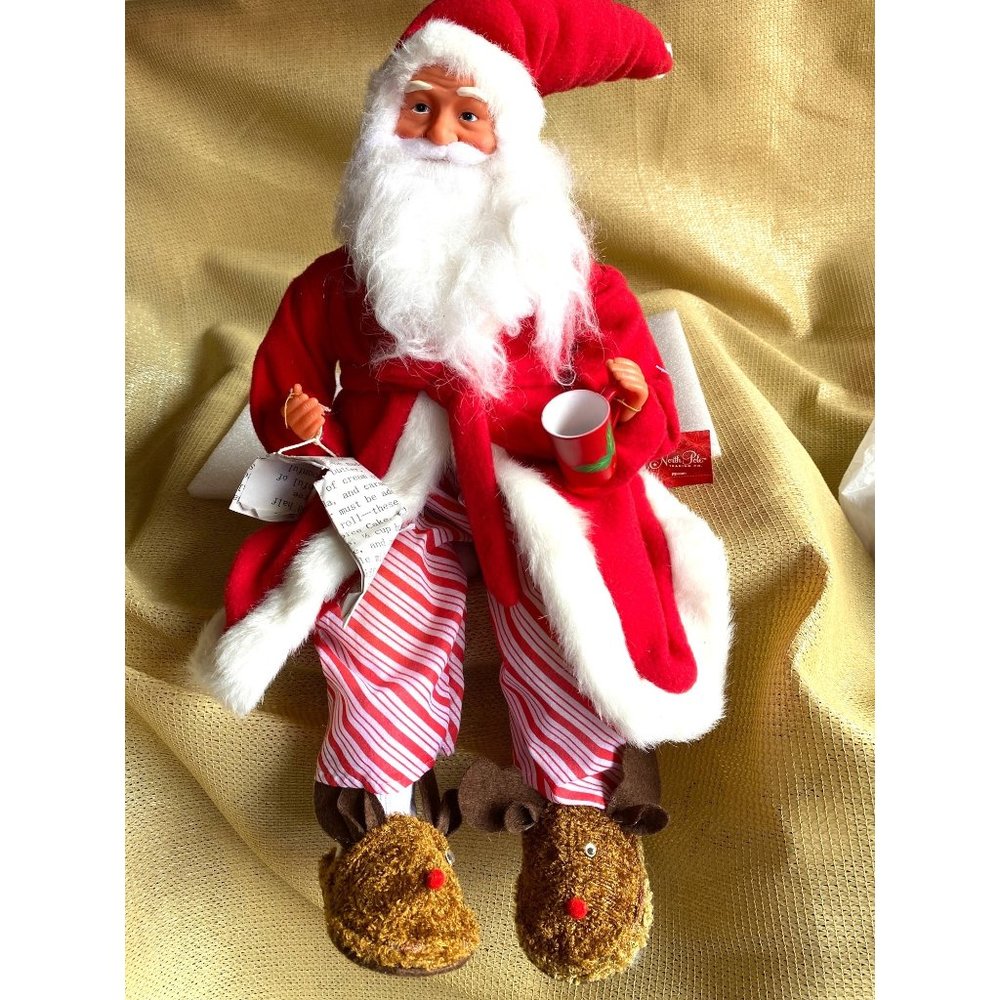 Santa North Pole trading co sitting with cup of coffee large